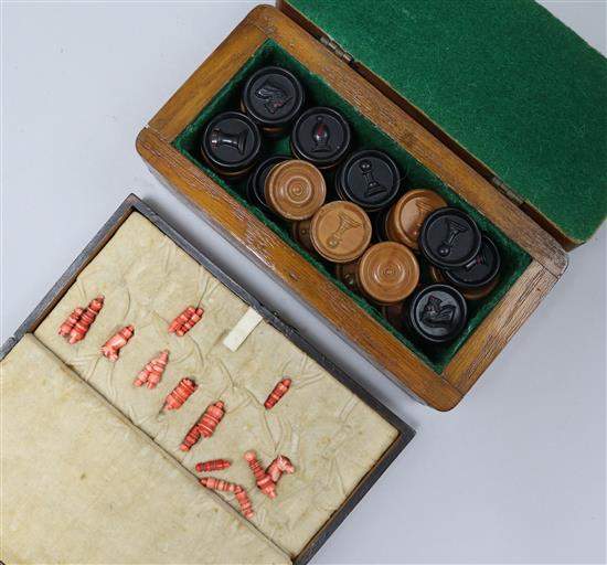 A bone travelling chess set and counters